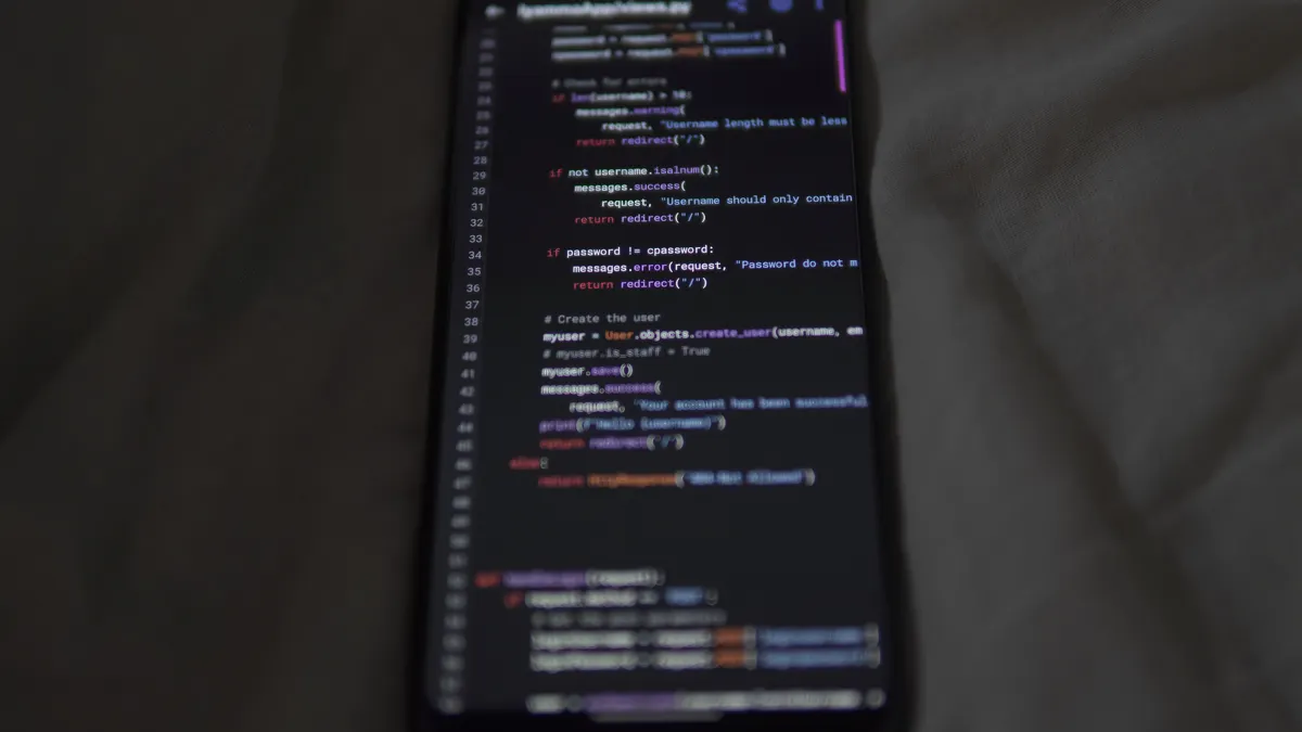 No-code SEO workflows — The Complete Guide No-code SEO workflows — The Complete Guide — Close-up of a Smartphone Screen Displaying a Python Code